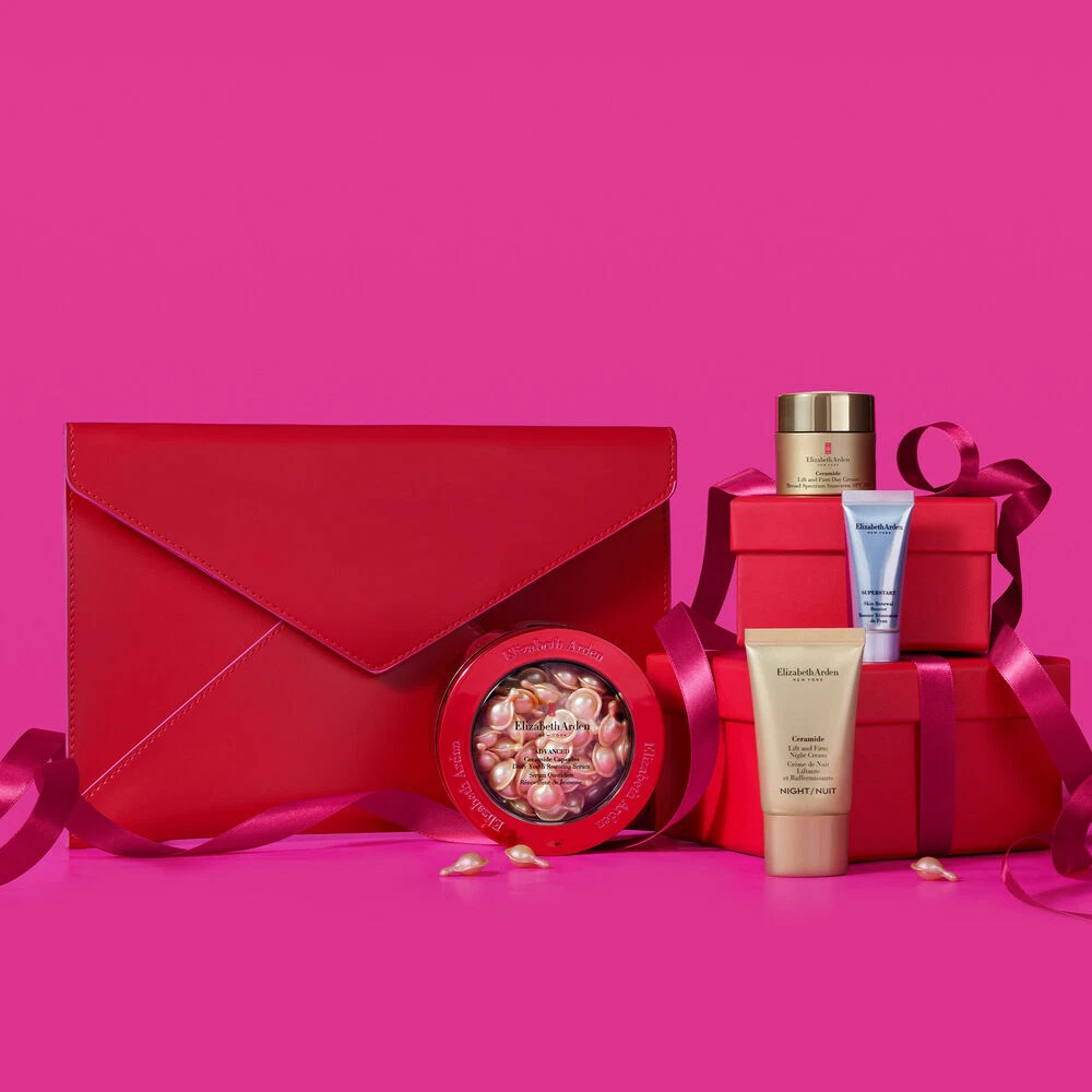 ELIZABETH ARDEN Merry Skin Essential Replenisher 4 Piece Set + Bag